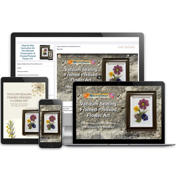 A composite image showing the "Vacuum Sealing Pressed Flower Art" online course video displayed on a laptop, desktop monitor, tablet, and smartphone. The screens show a framed piece of pressed flower art with a yellow and pink flower, demonstrating how the course content is accessible on multiple devices.